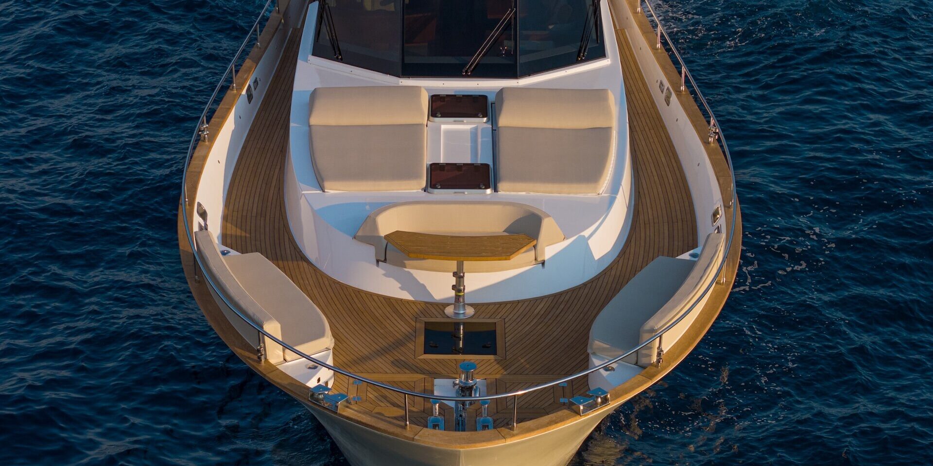 From Boat Show Inspiration to Your Own Yacht: A Buyer’s Guide Bow deck of a motor yacht seen from above
